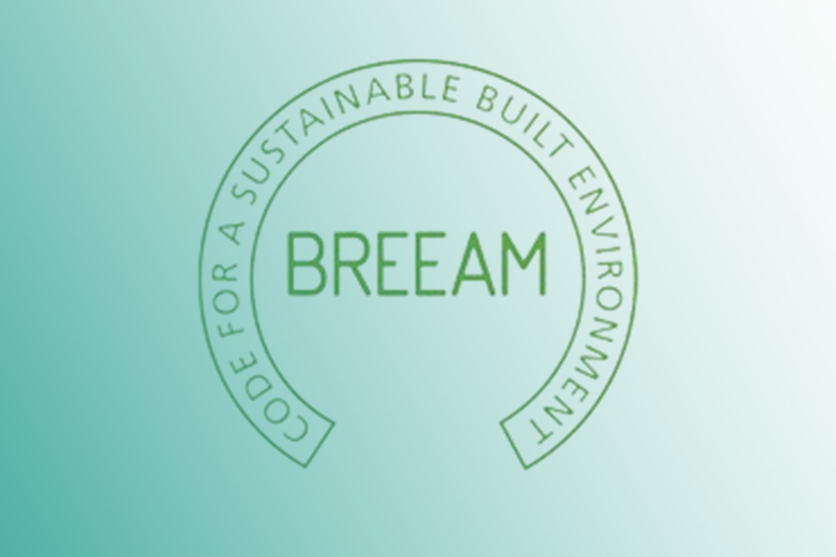 “A sustainability professional reviewing environmental performance documents and digital data visualisations, representing the BREEAM (Building Research Establishment Environmental Assessment Method) certification process.”