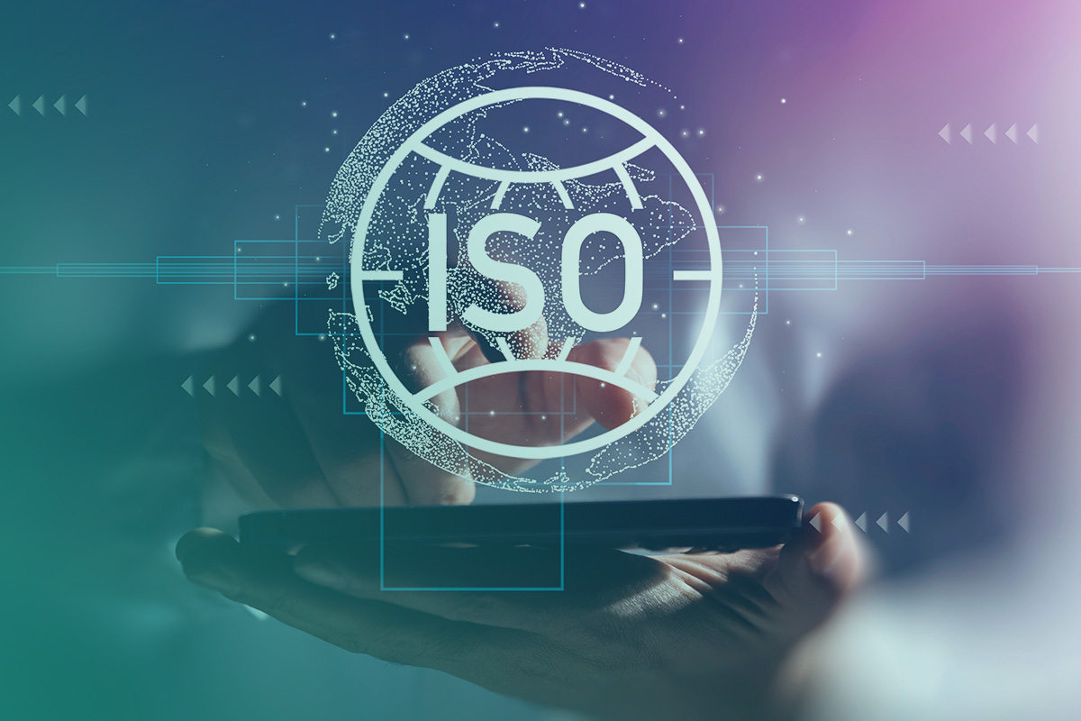 “A digital interface displaying an ISO symbol above a tablet, representing the Design, Implementation and Management Of ISO 14001 & 50001 Systems for organisational sustainability and energy management.”