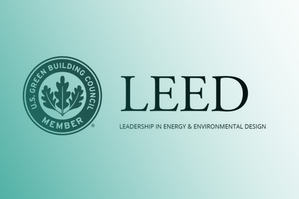 “LEED (Leadership In Energy and Environmental Design) logo displayed alongside the U.S. Green Building Council emblem on a soft gradient background.”