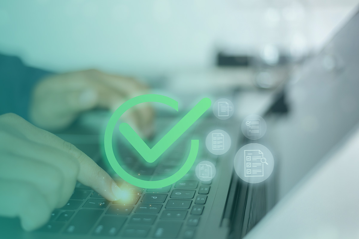 “Hands typing on a laptop with a digital checkmark symbol representing compliance with the Measuring Instruments Directive (MID).”