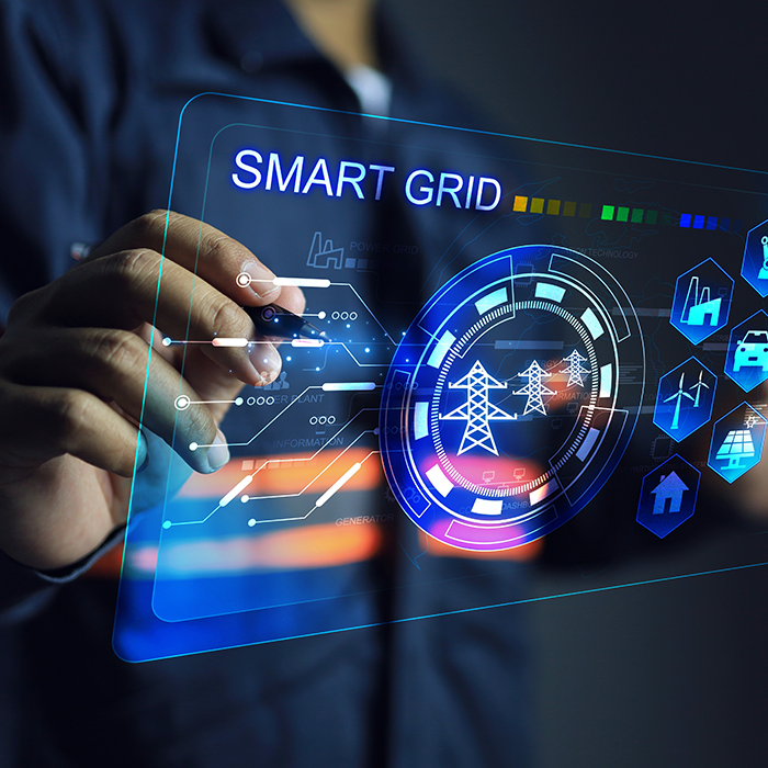 Energy management specialist interacting with a digital smart grid interface displaying energy flow and infrastructure data.