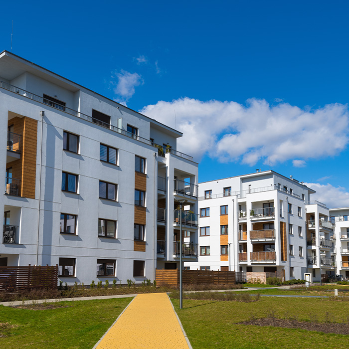 Modern residential and commercial apartment buildings supported by bill validation services for business energy accuracy.