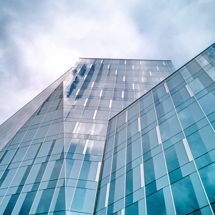 Glass-fronted commercial office building representing the type of property that benefits from AMR metering.