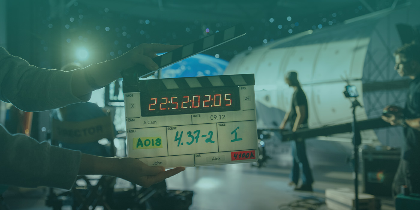 TV and film production crew on set with a clapperboard in focus, symbolising energy data gathering for ESOS Phase 3 reporting.