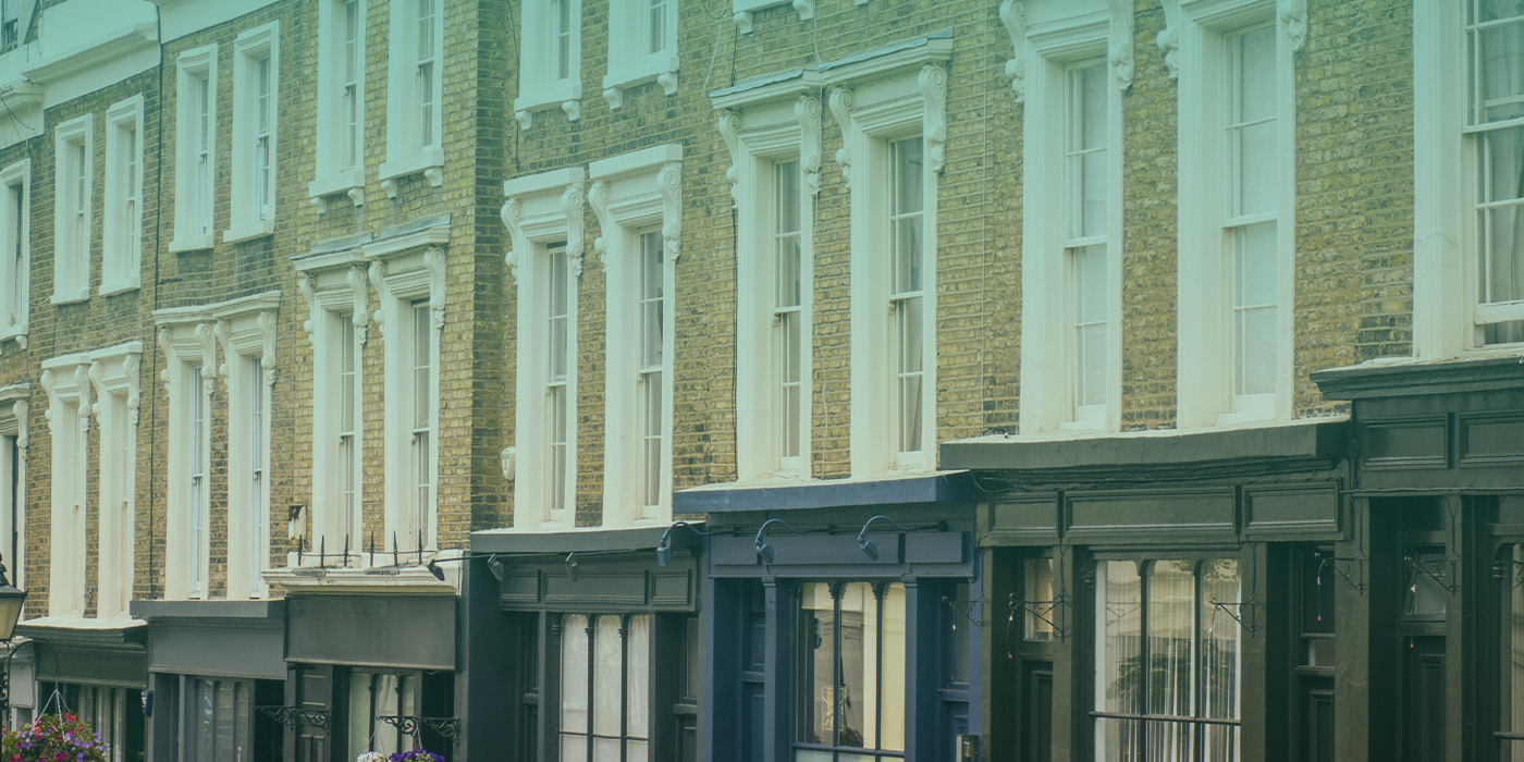 Row of retail and office buildings representing a national property portfolio upgraded to meet EPC requirements.