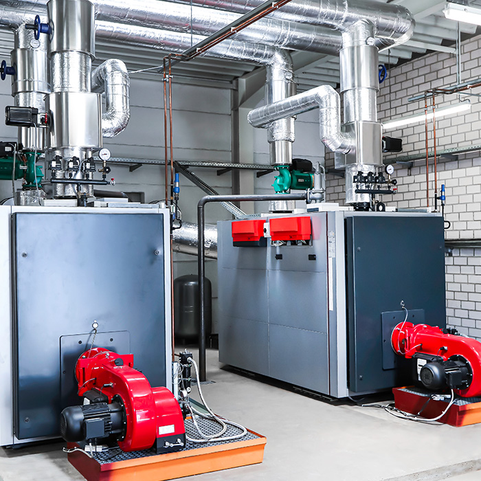 Industrial heating and ventilation equipment illustrating operational factors in Fixed vs Flexible Business Energy Procurement decisions.