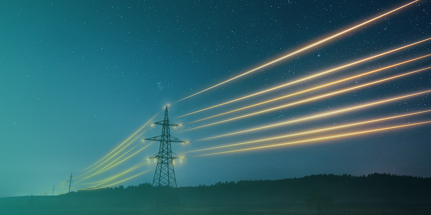 Electricity pylons at night with glowing energy trails representing the flow of data and power managed through MOP DC DA AMR Contracts.