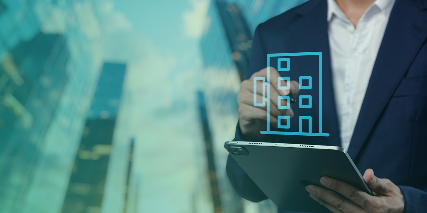 Property manager using digital tools to oversee buildings within Fixed Energy Tariffs Multi Site Portfolios.