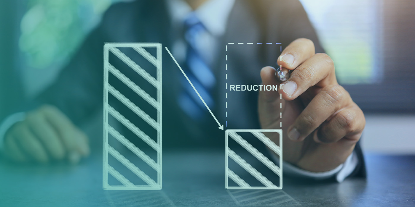Business professional illustrating cost reduction to show how organisations can reduce energy costs on fixed contracts through better control.