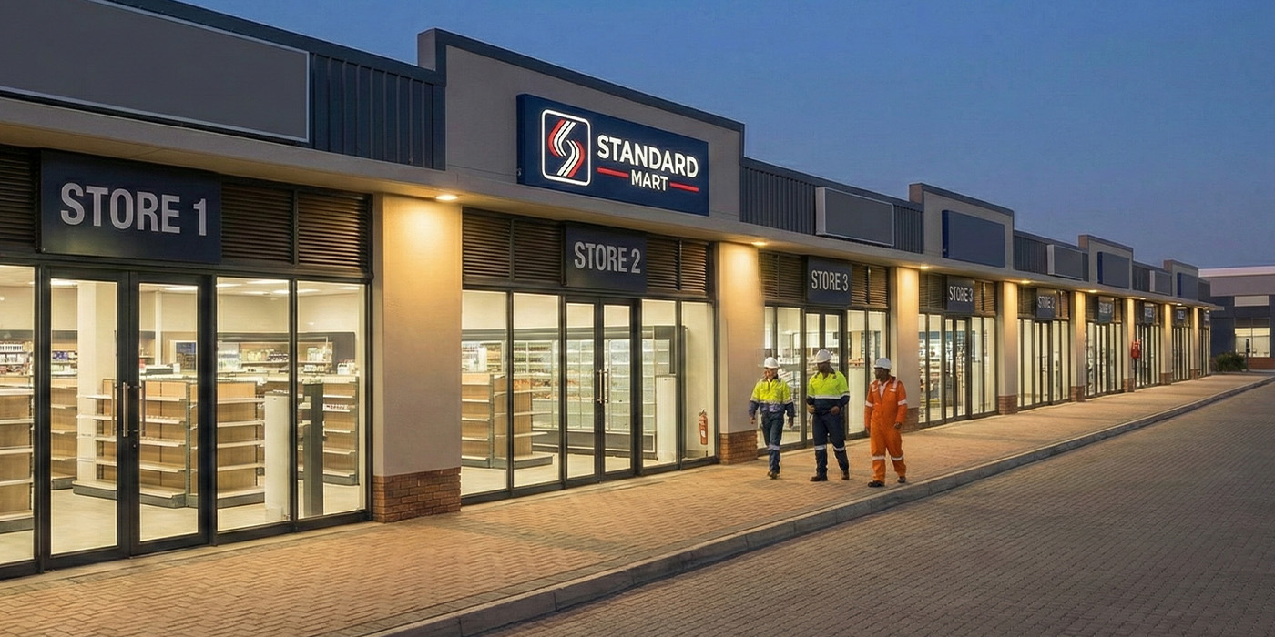 Multi-site retail units with engineers on site, illustrating how larger organisations reduce energy bills through energy monitoring across multiple locations.